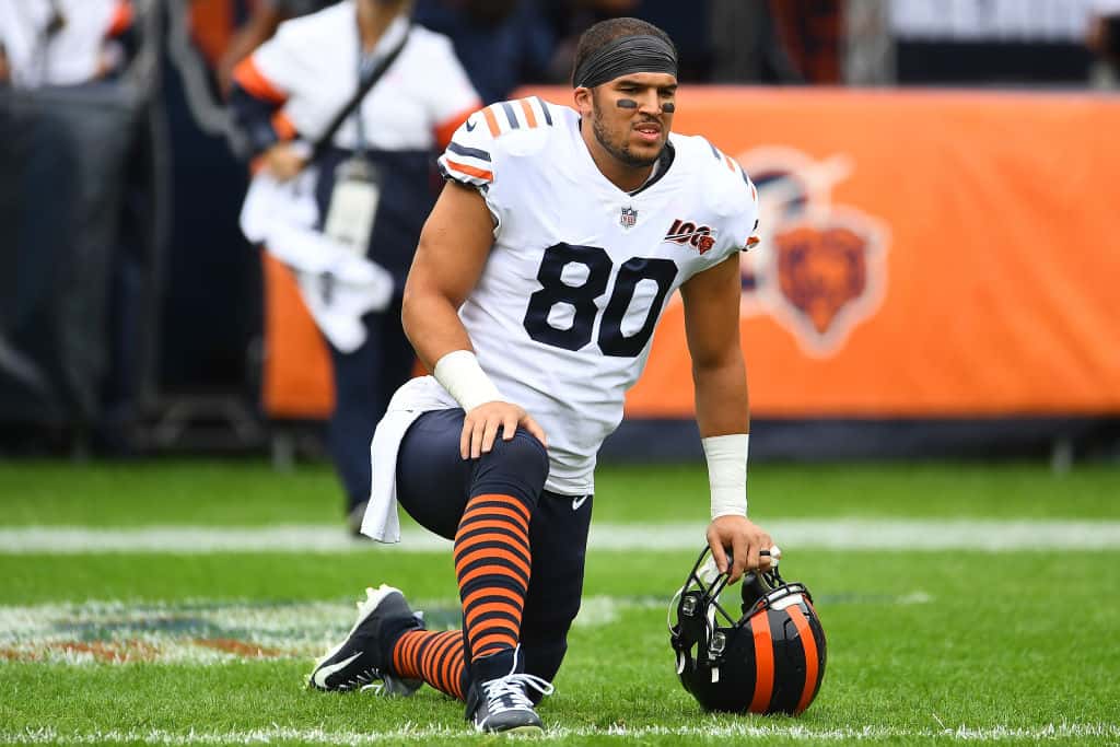 Trey Burton takes a knee before a Chicago Bears game