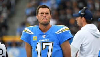 Chargers quarterback Philip Rivers looks on from the sideline.