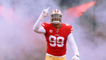 49ers defensive end DeForest Buckner runs out of the tunnel in 2019.