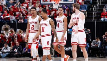 Indiana Hoosiers players take the floor during a game against the Nebraska Cornhuskers in the first round of the Big Ten Men's Basketball Tournament at Bankers Life Fieldhouse