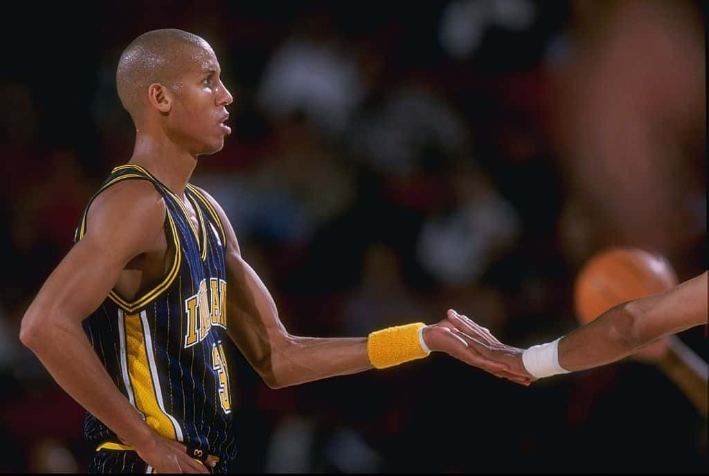 Reggie Miller high fives Pacers teammate
