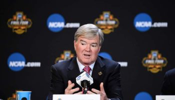 NCAA President Mark Emmert answers a question at a press conference