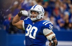 Colts defensive tackle Grover Stewart flexes after a big play.