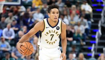 Pacers guard Malcolm Brogdon brings up the ball in a 2019-20 game.