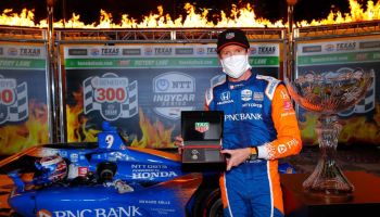 Scott Dixon, driver of the #9 PNC Bank Chip Ganassi Racing Honda, celebrates in Victory Lane after winning the NTT IndyCar Series - Genesys 300 at Texas Motor Speedway