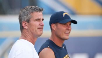 Frank Reich and Philip Rivers talk before a 2014 game.