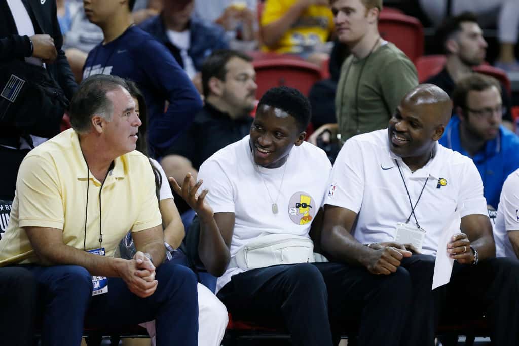 General manager Kevin Pritchard, Victor Oladipo #4 and head coach Nate McMillan of the Indiana Pacers look on during the game between the Atlanta Hawks and the Indiana Pacers