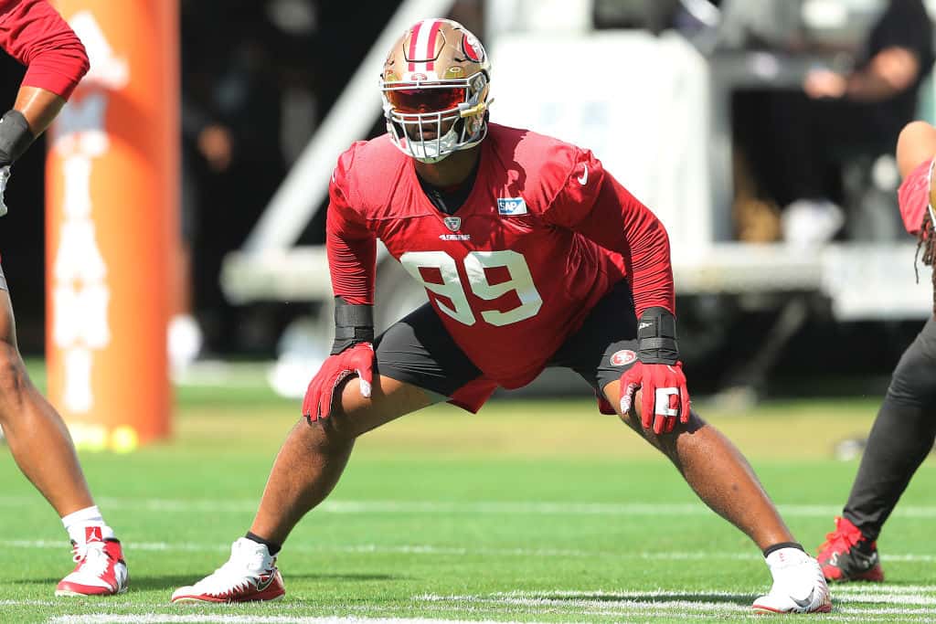 DeForest Buckner #99 of the San Francisco 49ers stretches during practice for Super Bowl LIV at the Greentree Practice Fields on the campus of the University of Miami on January 30, 2020 in Coral Gables, Florida
