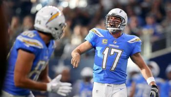 Former Chargers QB-Philip Rivers gets ready for a play in 2019.