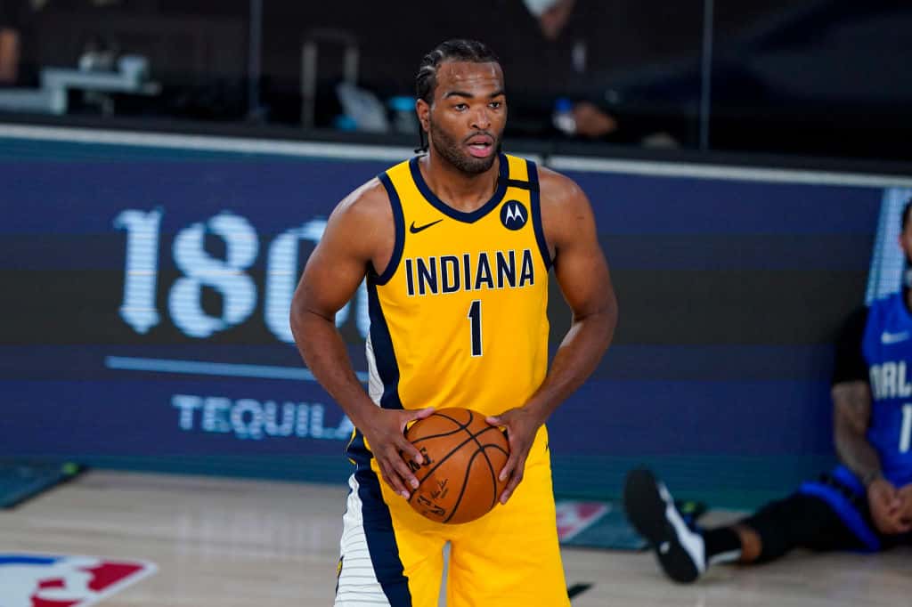 Pacers forward T.J. Warren looks to pass in a bubble game in Orlando.