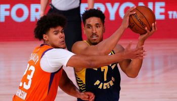 Pacers guard Malcolm Brogdon tries to pass against the Suns.