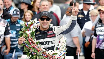 Tony Kanaan of Brazil, driver of the Hydroxycut KV Racing Technology-SH Racing Chevrolet, celebrates in victory circle during the IZOD IndyCar Series 97th running of the Indianpolis 500 mile race at the Indianapolis Motor Speedway on May 26, 2013 in Indianapolis, Indiana.