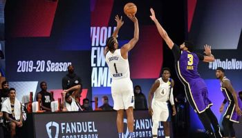 Pacers forward T.J. Warren shoots over the Lakers.