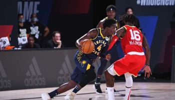Pacers Victor Oladipo tries to drive against the Rockets.