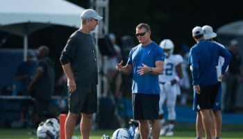 Frank Reich and Chris Ballard chat before practice.