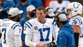 Colts QB-Philip Rivers talks on the sideline.