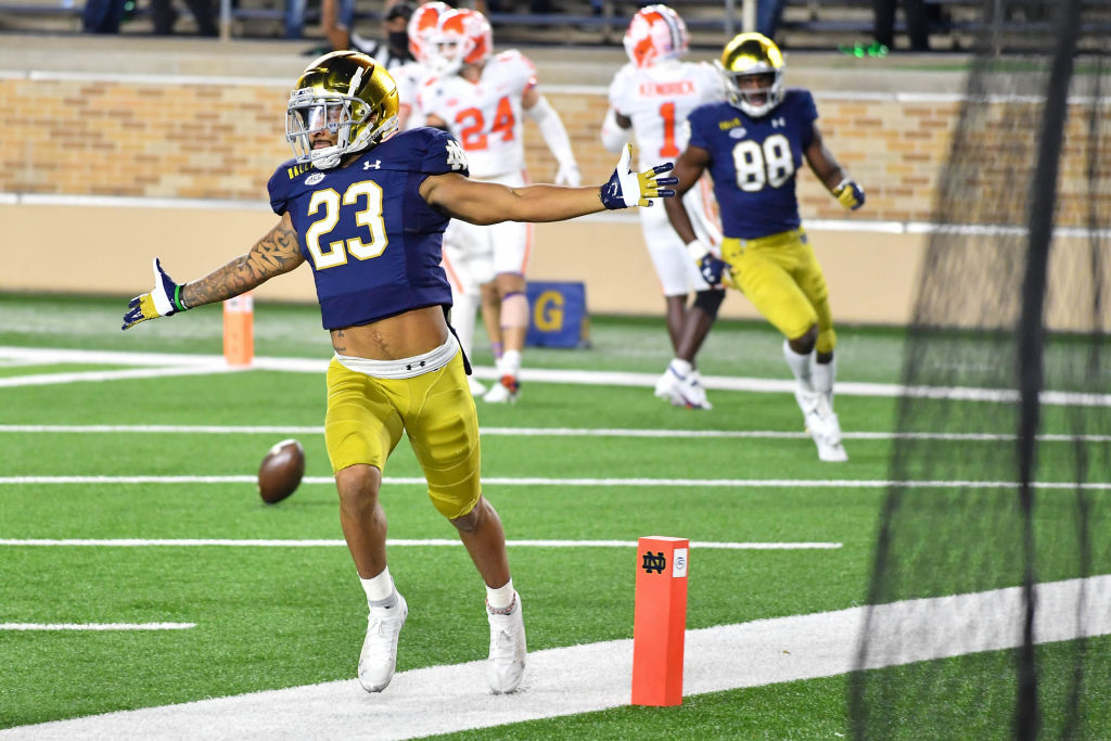 Kyren Williams celebrates in the end zone after scoring a touchdown for Notre Dame against Clemson
