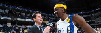 Pacers forward Justin Holiday talks after a game.