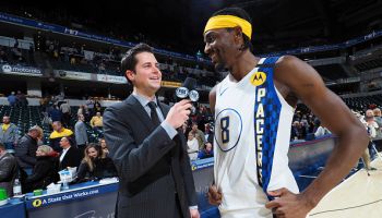 Pacers forward Justin Holiday talks after a game.