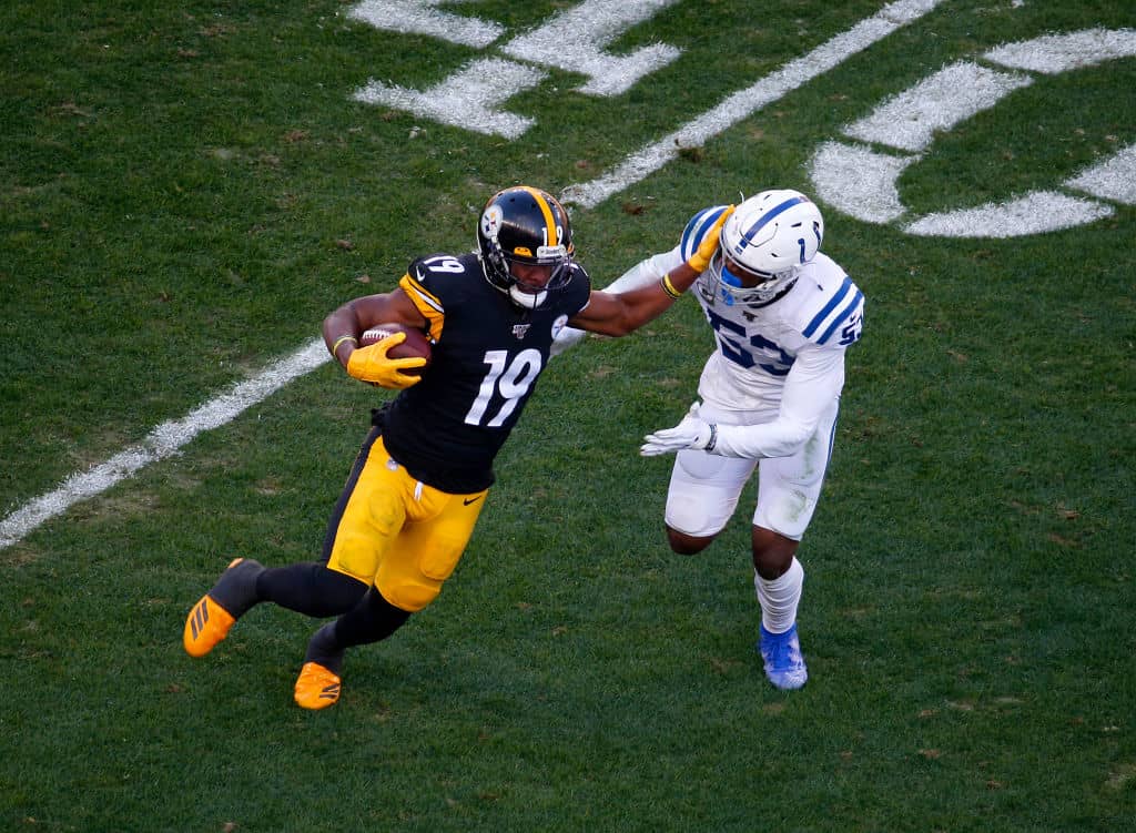 Steelers wideout JuJu Smith-Schuster runs after the catch.