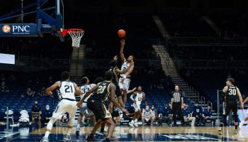Aaron Thompson puts up a floater for the Butler Bulldogs with Western Michigan guarding him in the paint