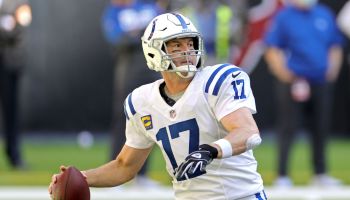 Colts QB-Philip Rivers gets ready to throw a pass.