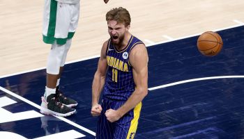 Domantas Sabonis celebrates after converting the game winning bucket over the Boston Celtics