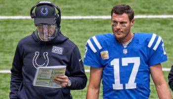 Colts QB-Philip Rivers talks to Frank Reich during a game.