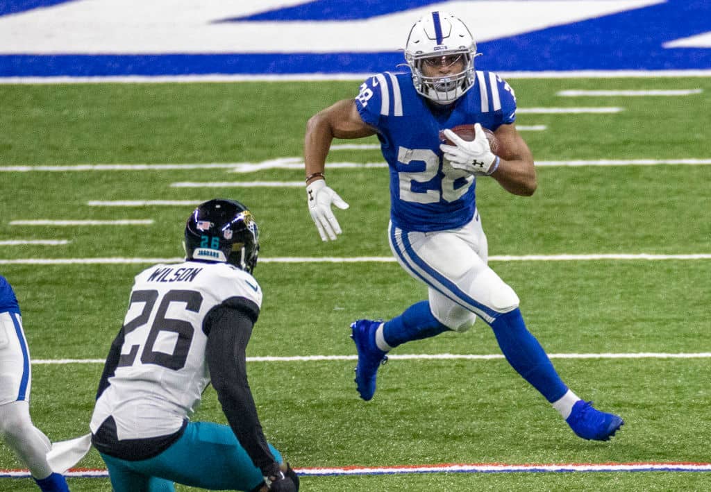 Colts RB-Jonathan Taylor runs in the open field.