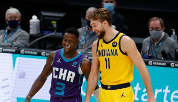 Pacers F-Domantas Sabonis talks with the Hornets before the game.