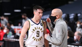 Pacers guard T.J. McConnell talks to Nate Bjorkgren during a win over Portland.