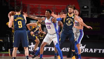 Pacers guard T.J. McConnell and forward Domantas Sabonis play against the Pistons.