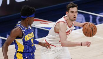 Pacers guard Aaron Holiday defends Chicago's Tomas Satoransky as Indiana takes on the Bulls