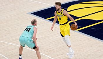 Pacers forward Domantas Sabonis tries to drive in a game.