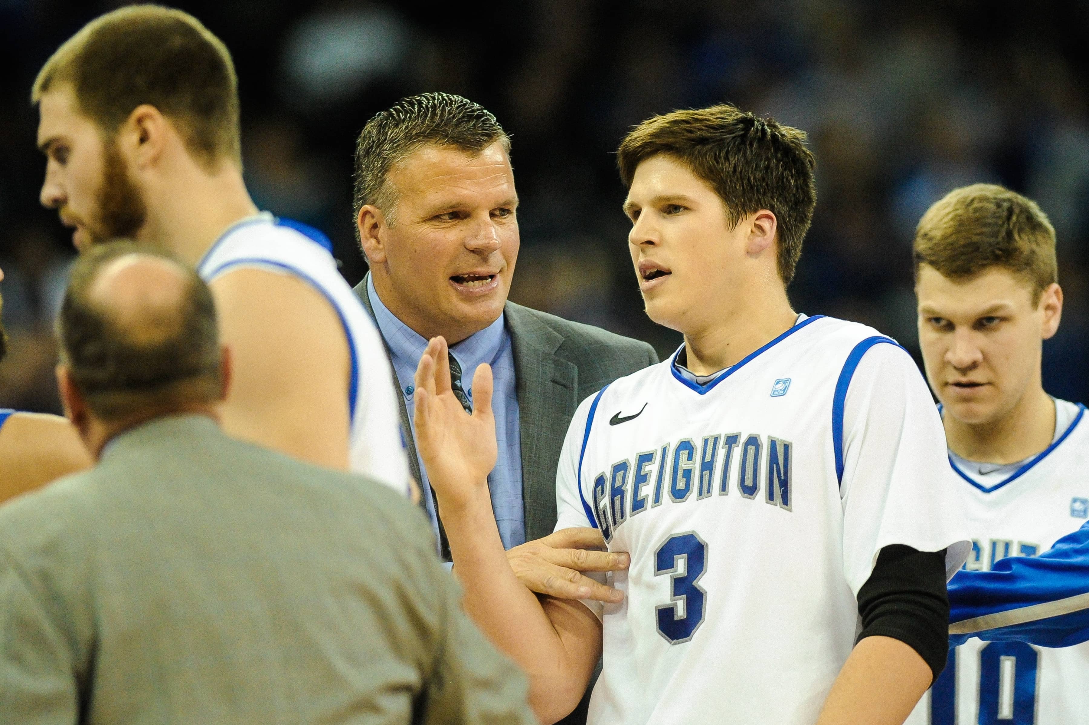 Doug McDermott #3 of the Creighton Bluejays chats with dad and head coach Greg McDermott of the Creighton Bluejays during their game at the CenturyLink Center on December 29, 2012 in Omaha, Nebraska.