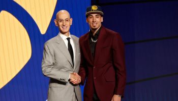 Chris Duarte looks onward and shakes the hand of NBA Commish Adam Silver moments after being drafted by the Indiana Pacers