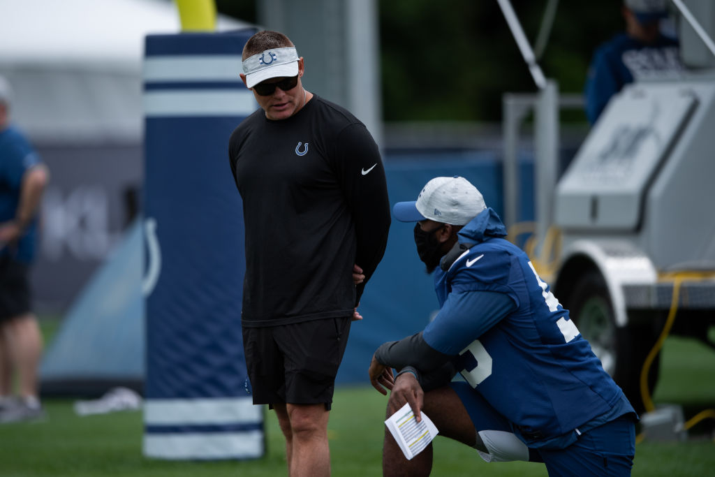 Chris Ballard talks to Darius Leonard during practice.
