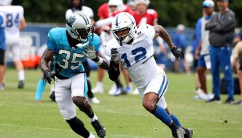 DeMichael Harris runs a 1 on 1 route against a Carolina Panthers defender during a joint practice
