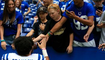 Kylen Granson takes time to sign autographs for fans in Detroit