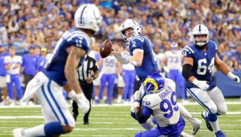 Colts QB-Carson Wentz goes down when attempting a pass.