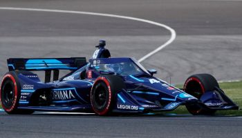 Jimmie Johnson turns in his number 48 machine in the GMR Grand Prix at the Indianapolis Motor Speedway