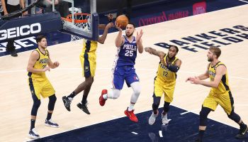 Ben Simmons going up for layup amongst Pacers players