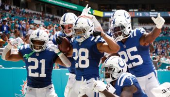 Colts players celebrate after a touchdown.