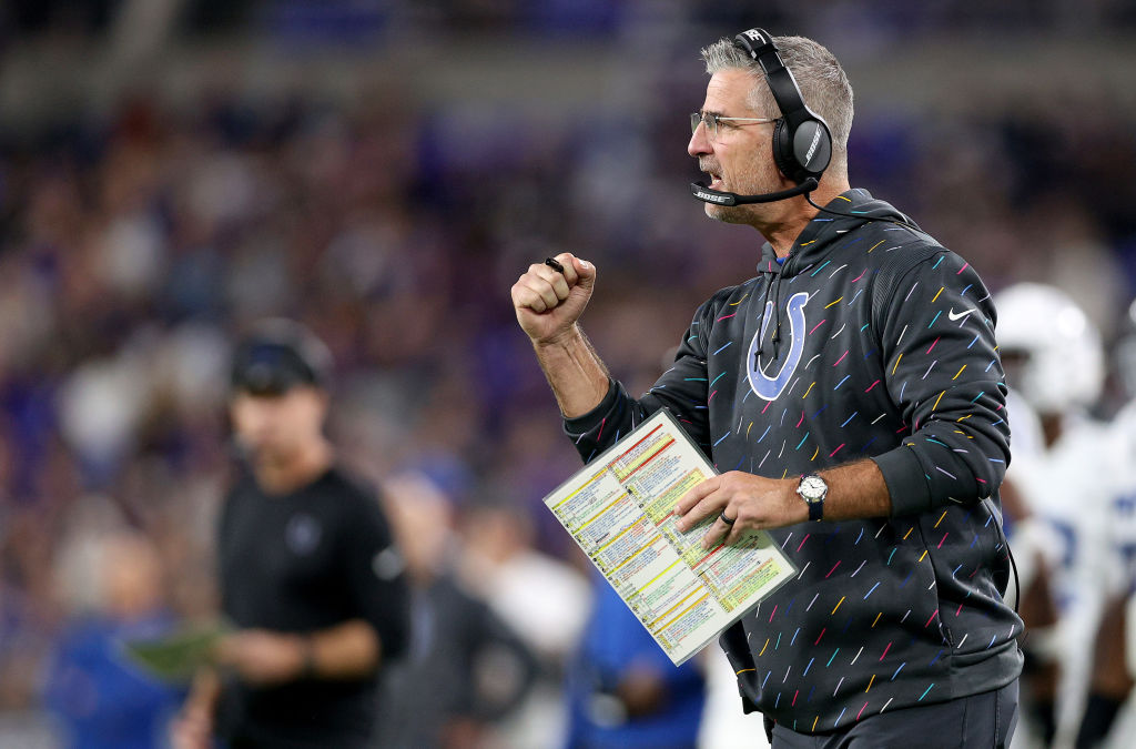 Colts HC-Frank Reich pumps his fist during a game.