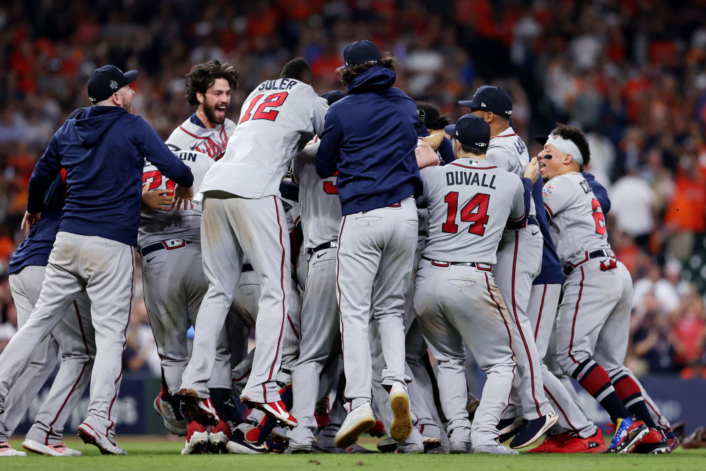 The Atlanta Braves celebrate their World Series in Houston with a dogpile on the mound
