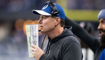 Colts DC-Matt Eberflus makes a call from the sideline.