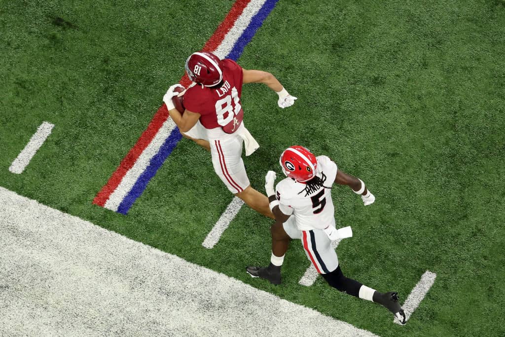 Georgia defender Kelee Ringo chases down an Alabama ball carrier up the sideline near the end zone