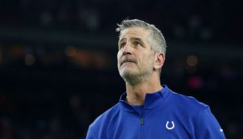 Colts HC-Frank Reich looks off into the distance during a game.