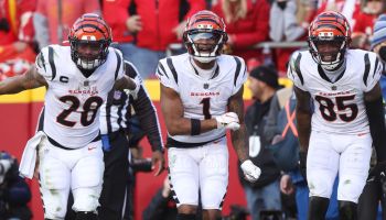 Ja'Marr Chase celebrates in the end zone with two Bengals teammates in the AFC Championship against the Chiefs