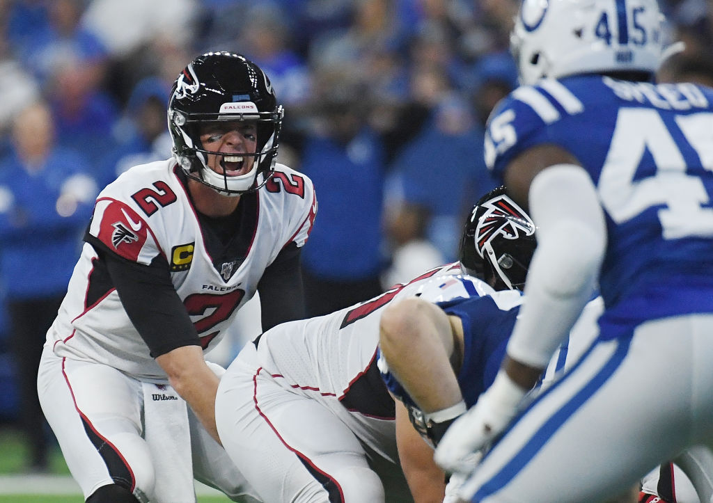 Matt Ryan waits under center for the football as the Colts defense lines up against him